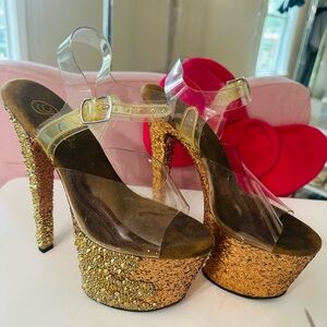 Pleaser Gold Glitter Platform Heels with Clear Straps